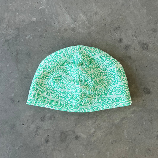 EMERALD SKULL CAP
